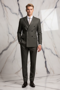 Olive suit on blonde model, marble studio background